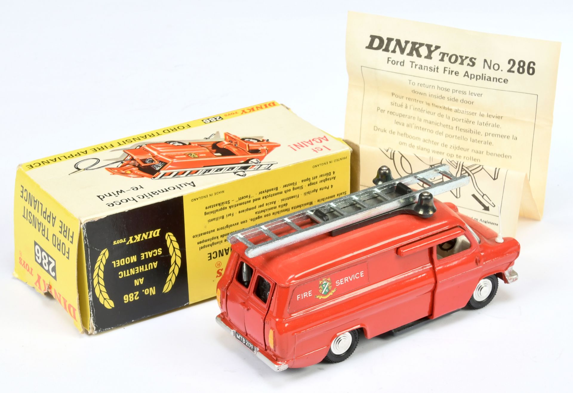 Dinky Toys 286 Ford Transit Fire Appliance "Fire Service" - Red body, Dark grey base, off white i... - Image 2 of 2