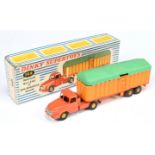 French Dinky Toys 36B Articulated Cattle Truck - Dull orange cab, yellow and red trailer with gre...