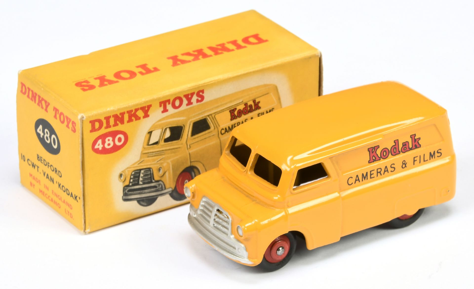 Dinky Toys 480 Bedford Van "Kodak" - Yellow body, red rigid hubs and silver trim 