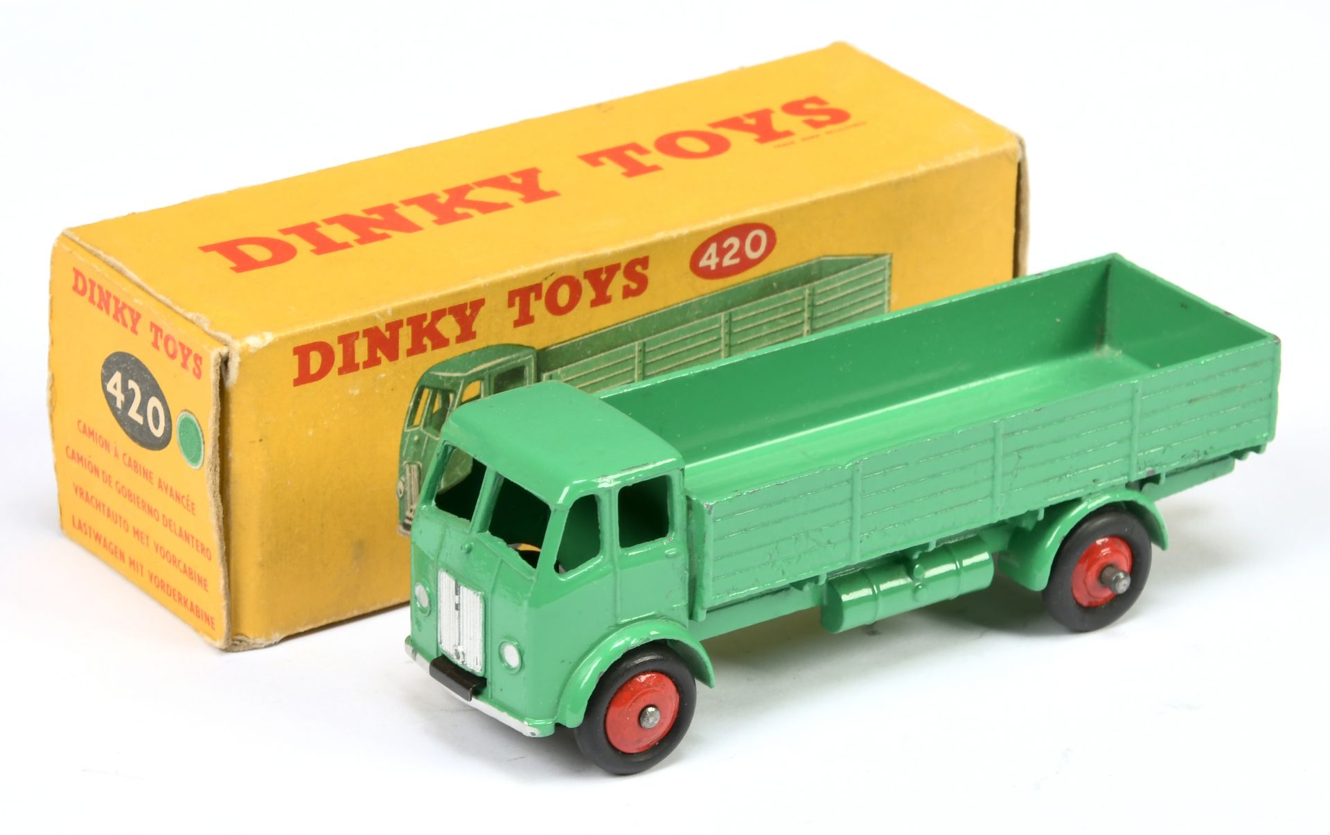 Dinky Toys 420 Forward Control Lorry - Mid green cab, back and chassis, red rigid hubs with smoot...