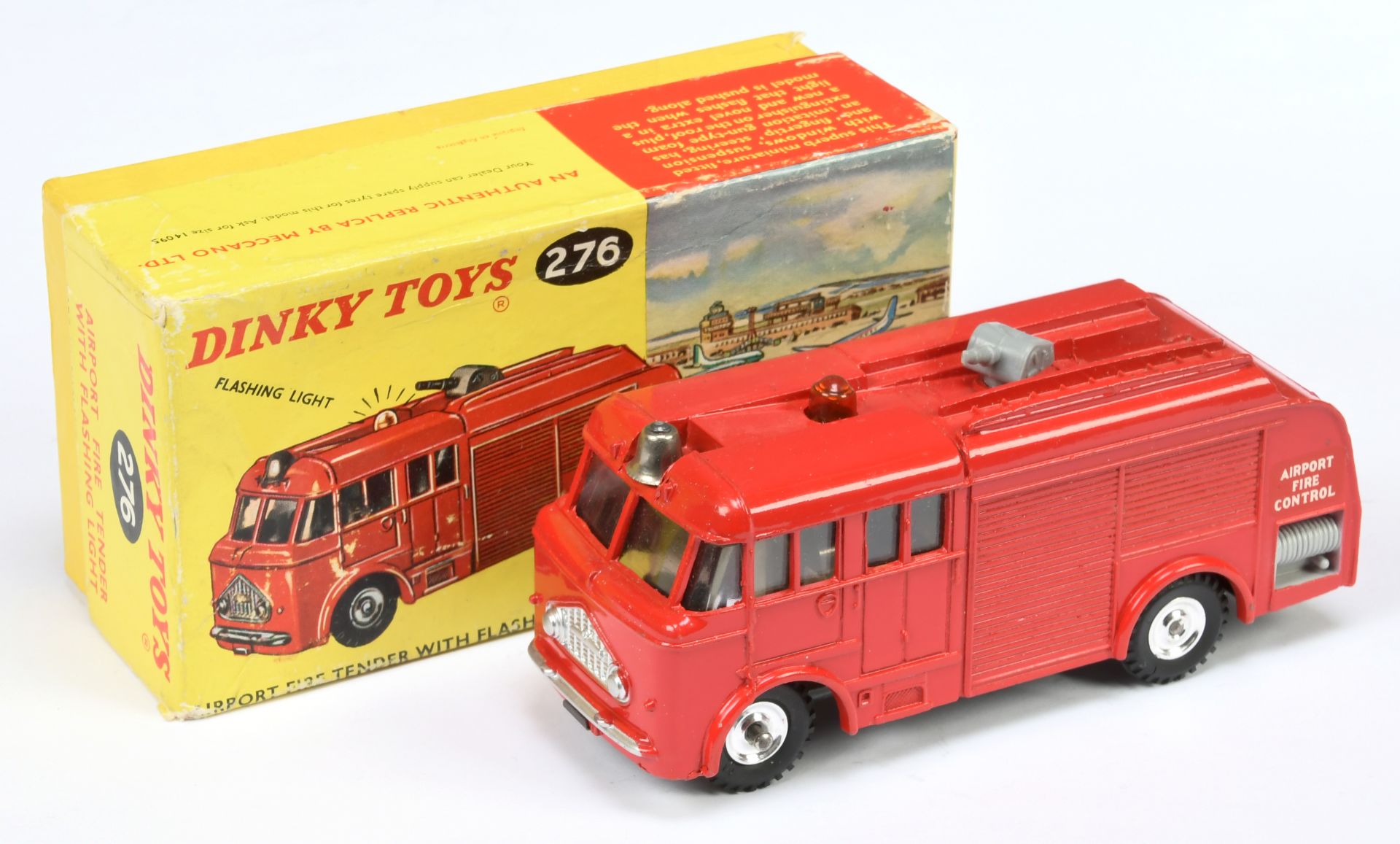 Dinky Toys 276 Airport Fire Engine - Red body, silver trim, grey plastic nozzle, bell, amber batt...