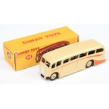 Dinky Toys 281 Luxury Coach - Light cream body and rigid hubs with smooth tyres, orange flashes a...