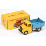 Dinky Toys 410 Bedford End Tipper - yellow cab, chassis and rigid hubs with smooth tyres, mid blu...