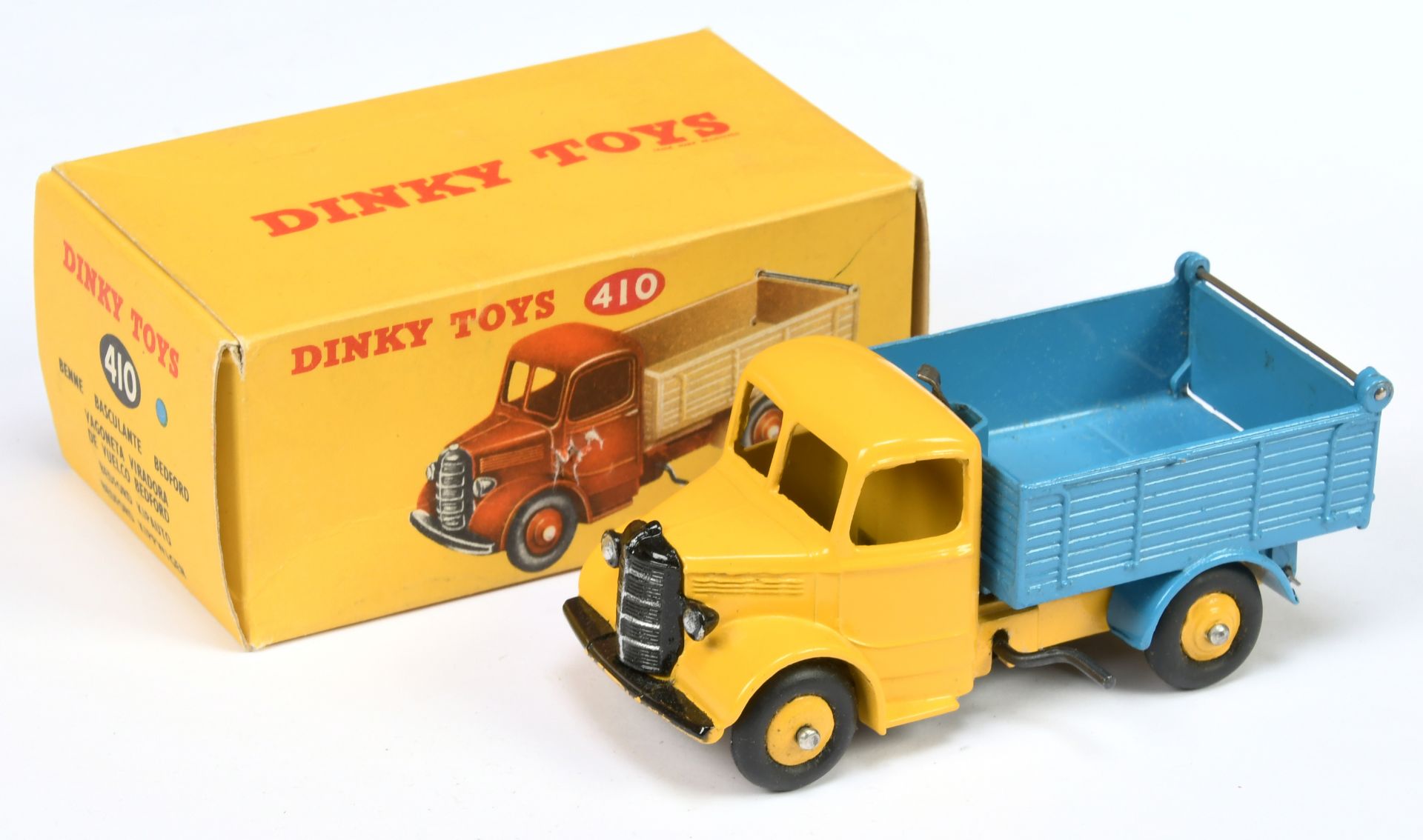 Dinky Toys 410 Bedford End Tipper - yellow cab, chassis and rigid hubs with smooth tyres, mid blu...