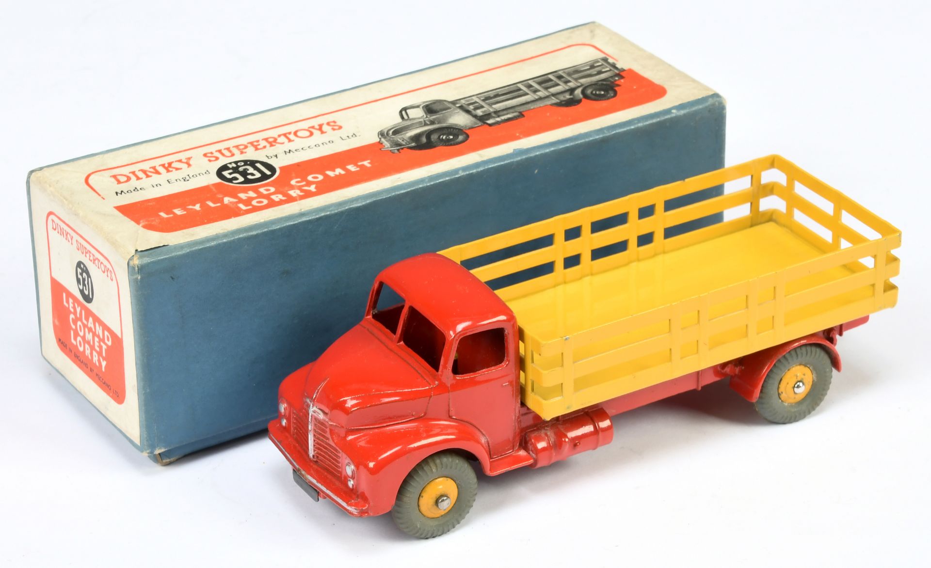 Dinky Toys 522 Leyland Comet Lorry - Red cab and chassis yellow stake back and rigid hubs with gr...