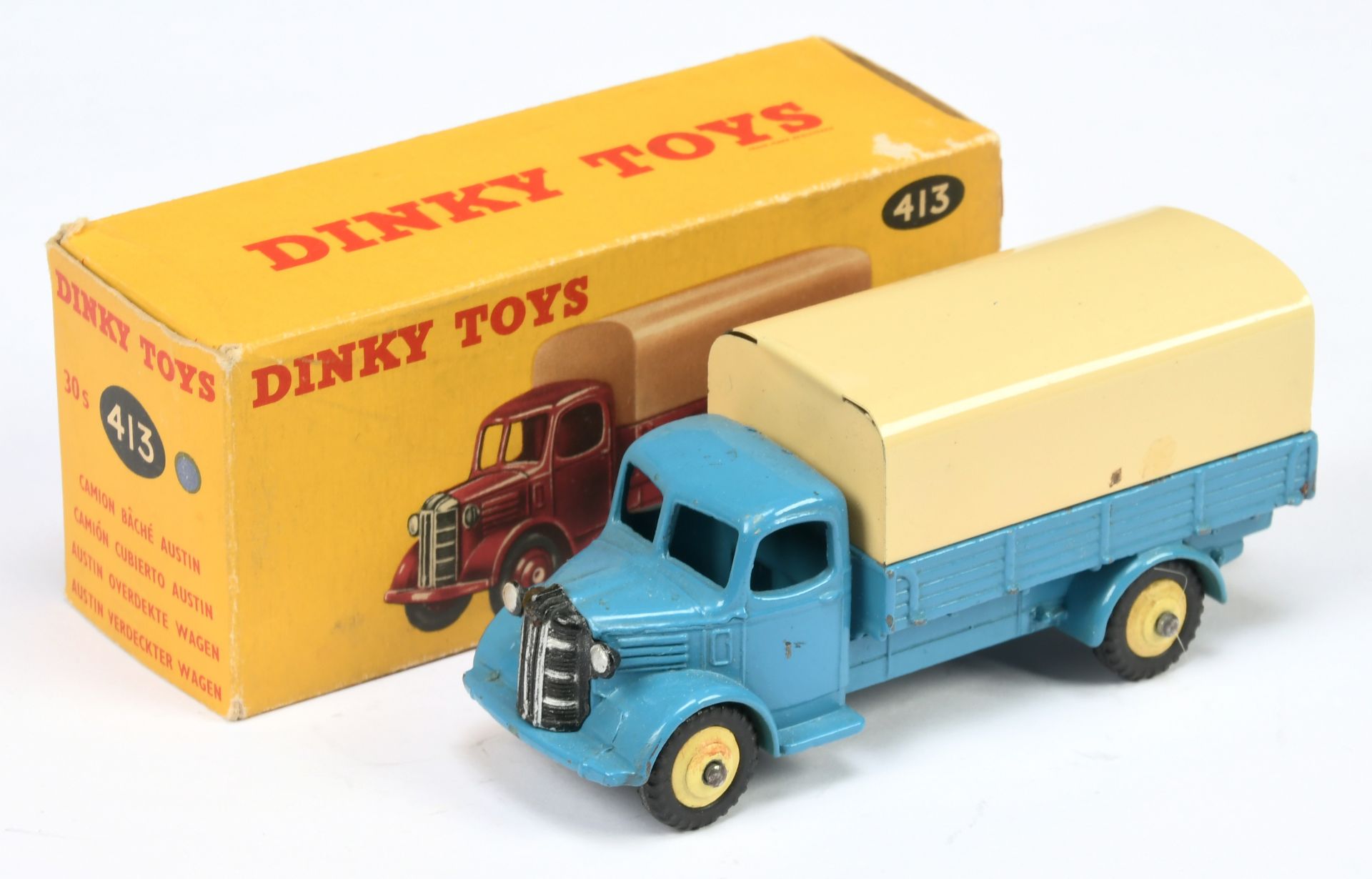 Dinky Toys 413  (30S) Austin Open Covered Wagon - Mid-blue cab and chassis, pale yellow rigid hub...