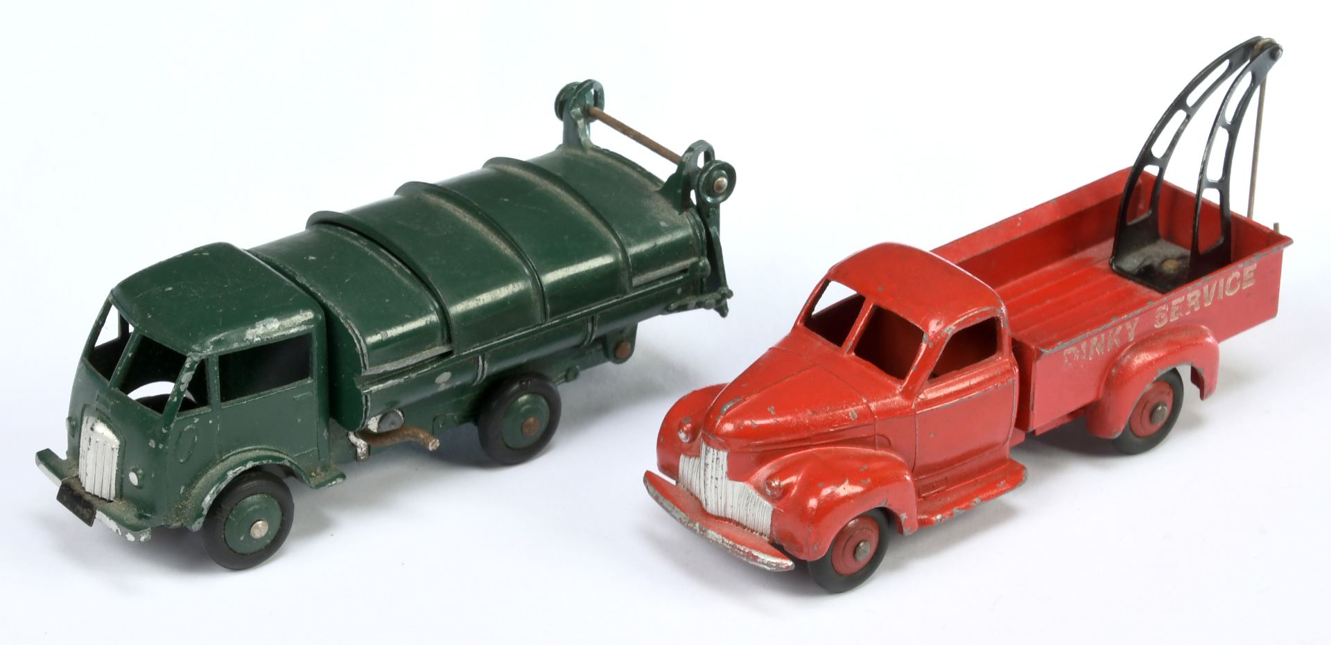 French Dinky Toys A Pair (1) 25R Studebaker Wrecker - Red body and convex, black jib and 25V Ford...