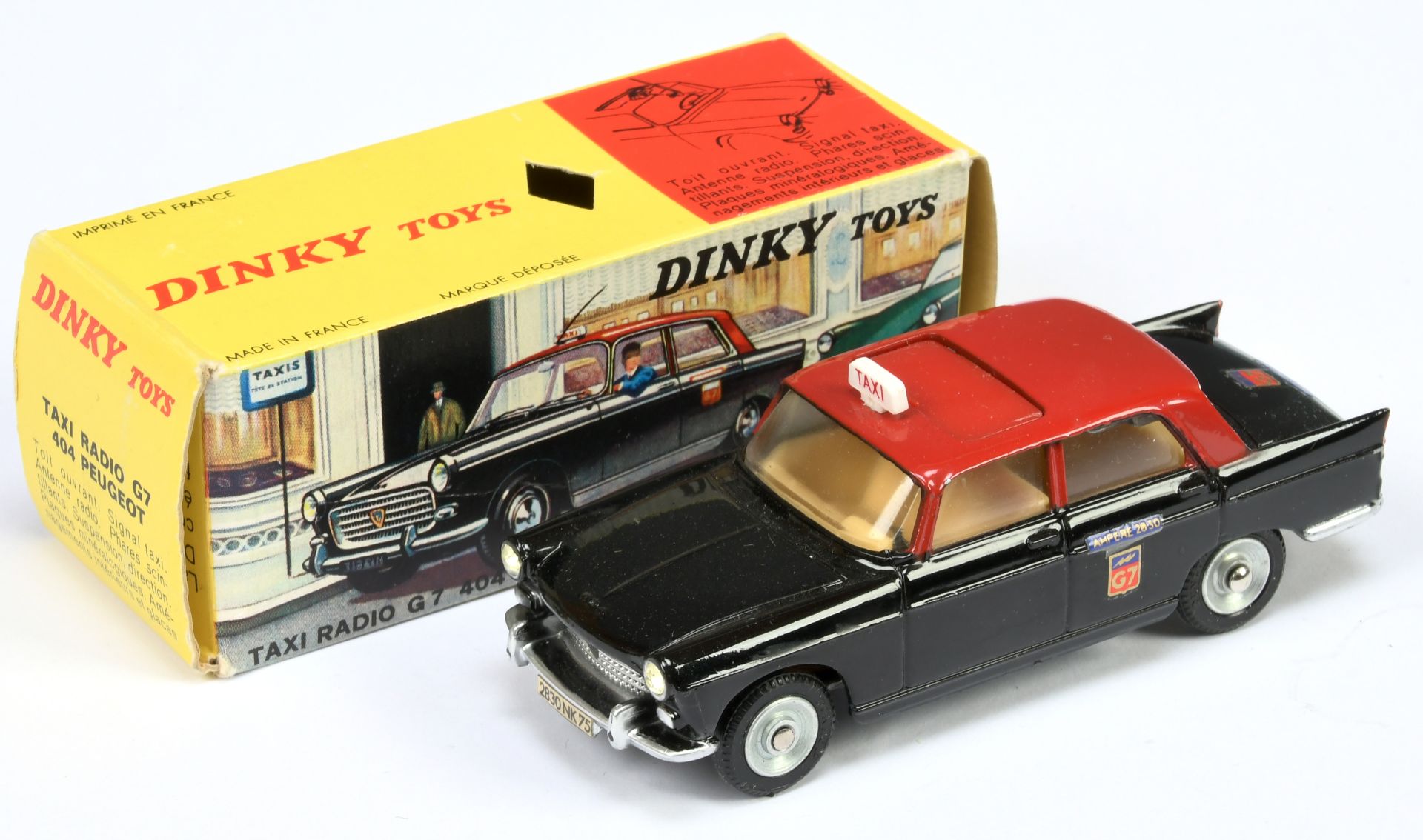 French Dinky Toys 1400 Peugeot 404 "Taxi" - Black body, red roof, light tan interior, roof box, s...