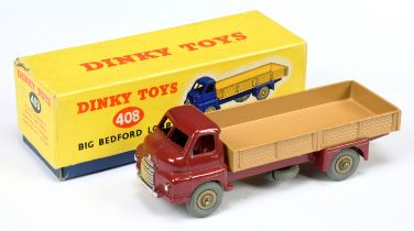 Dinky Toys 408 Big Bedford Lorry - Maroon cab and chassis, dark tan back, silver trim, supertoy h...