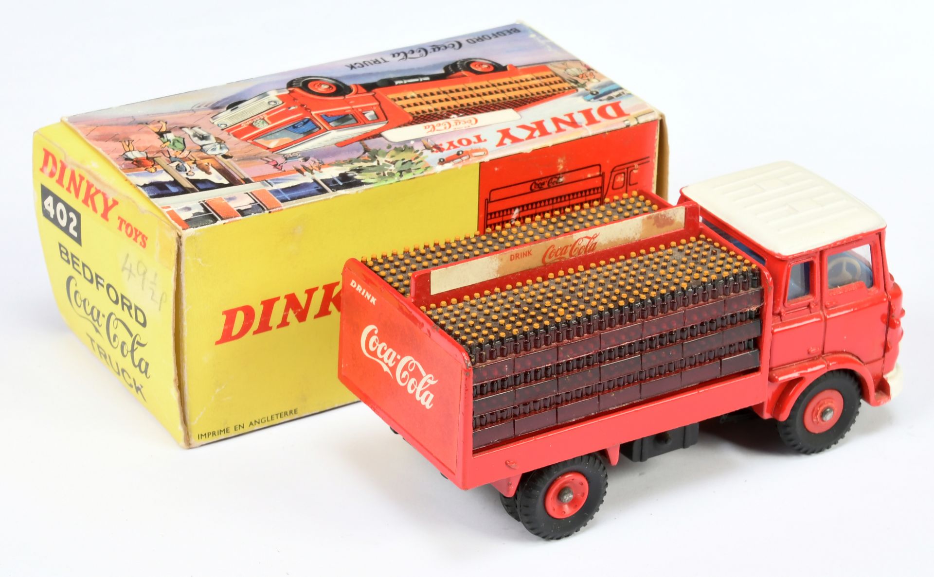 Dinky Toys 402 Bedford TK "Coca Cola" Delivery Truck - Red cab, back and plastic hubs, blue inter... - Image 2 of 2