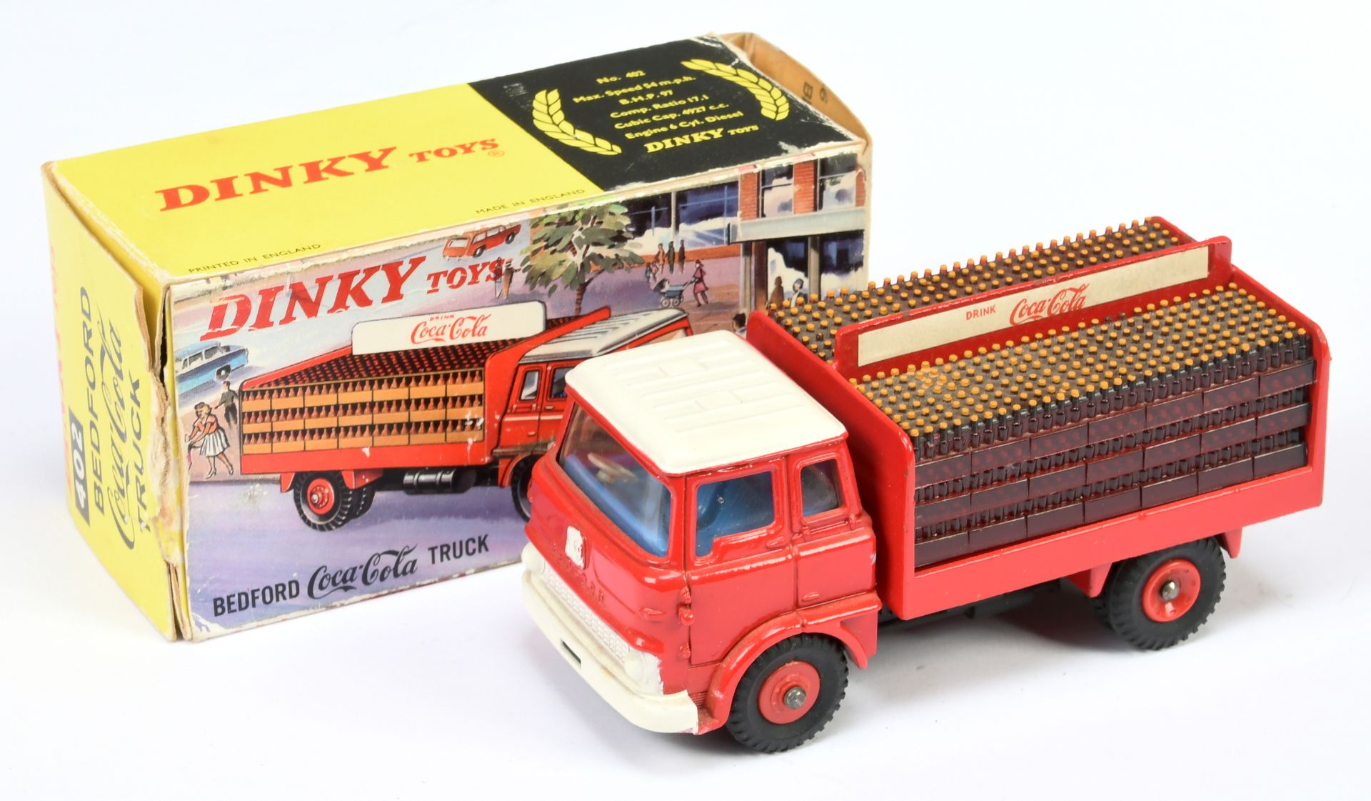 Dinky Toys 402 Bedford TK "Coca Cola" Delivery Truck - Red cab, back and plastic hubs, blue inter...