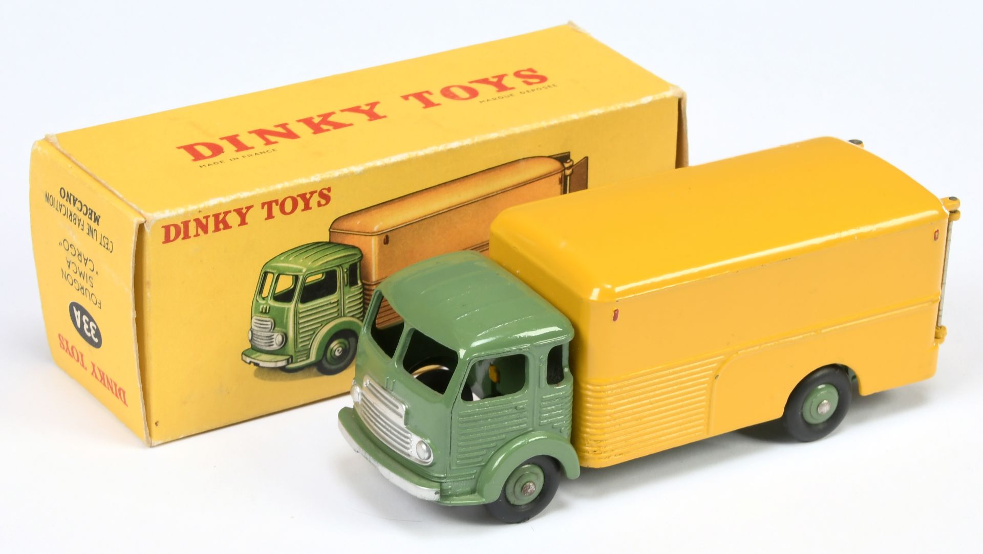 French Dinky Toys 33A Simca Cargo Truck - Drab green cab, chassis and convex hubs, yellow back an...