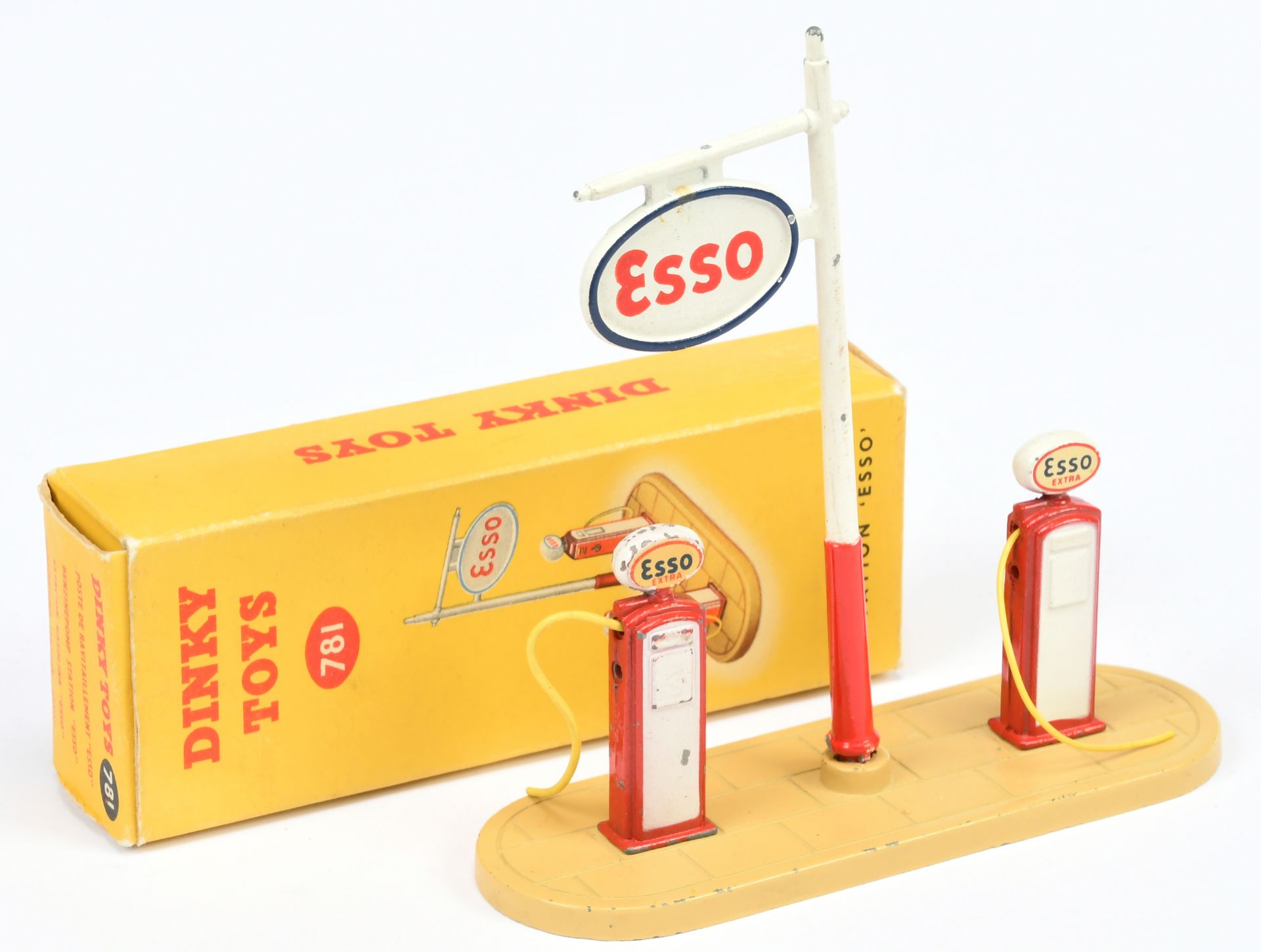 Dinky Toys 781 "ESSO" Petrol Pump Set - Metal base pumps and sign finished in cream, red, white a...