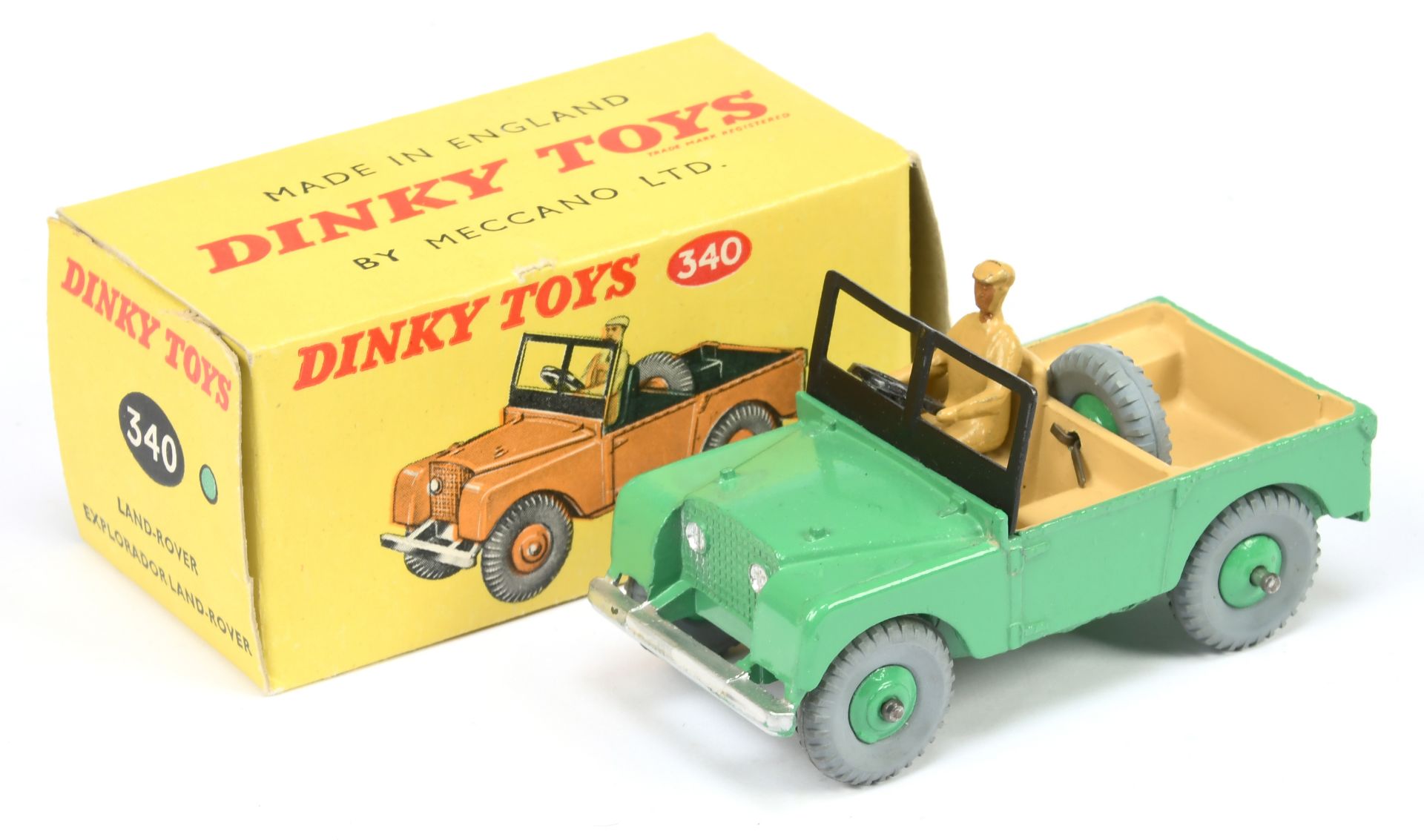 Dinky Toys 340 Land Rover - mid-green including rigid hubs with grey treaded tyres, deep cream in...