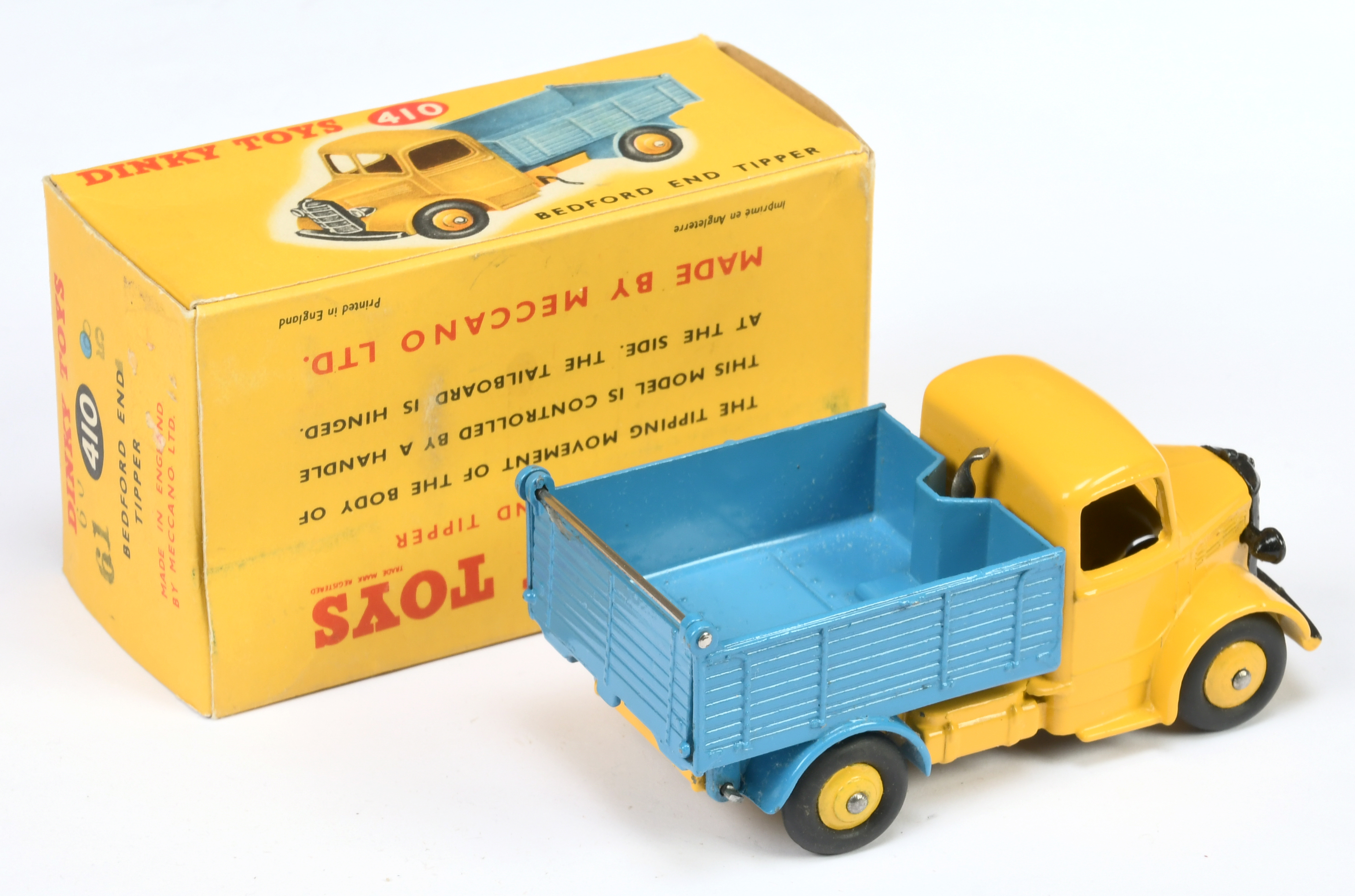 Dinky Toys 410 Bedford End Tipper - yellow cab, chassis and rigid hubs with smooth tyres, mid blu... - Image 2 of 2