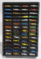 Mattel Hotwheels, an unboxed group of 60, in a Plastic Display Case