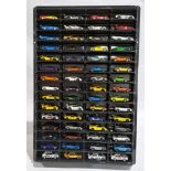 Mattel Hotwheels, an unboxed group of 60, in a Plastic Display Case