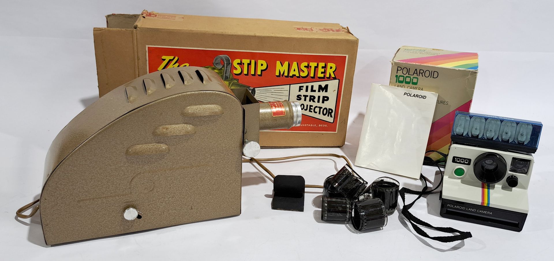 Stip Master (UK) 35mm Film Strip Projector & Polaroid 1000 Instant Colour Pictures Camera, a boxe...