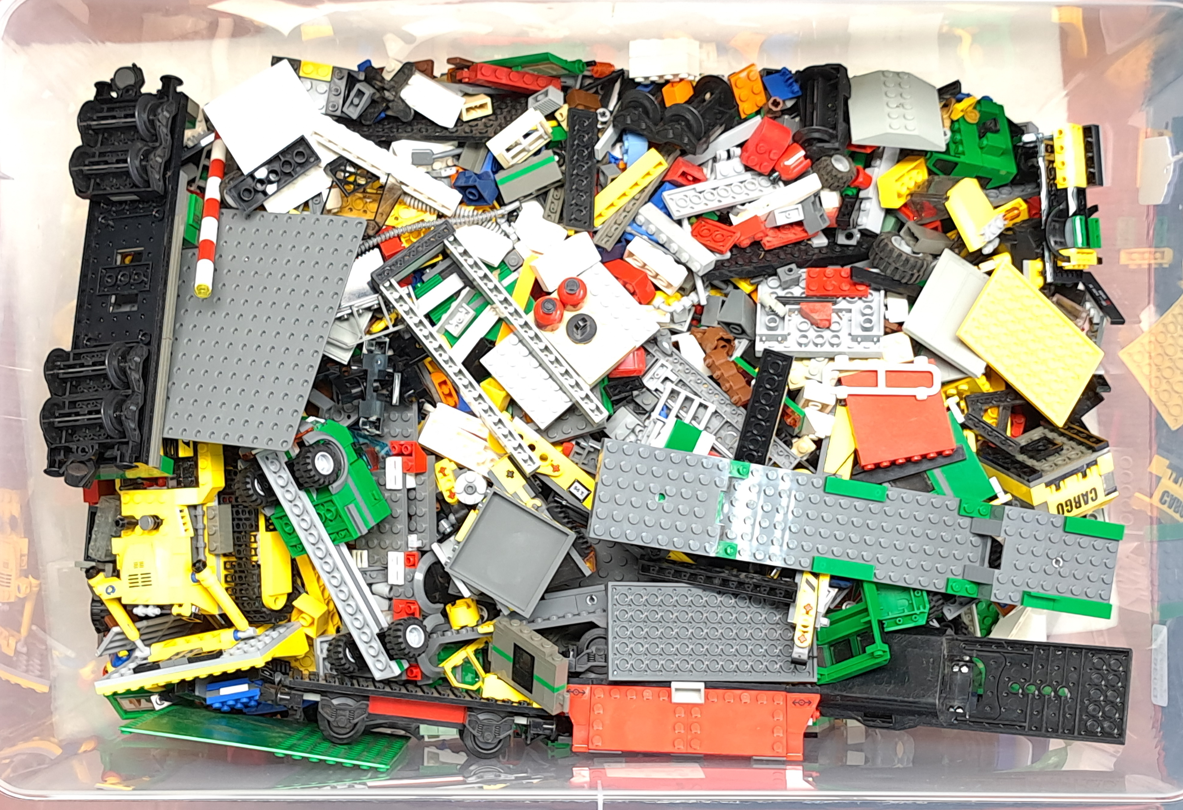 Lego a large unboxed quantity of loose items to include various colour parts, part built models, ...