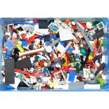 Lego a large unboxed quantity of loose items to include various colour parts, part built models, ...