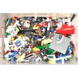 Lego a large unboxed quantity of loose items to include various colour parts, part built models, ...