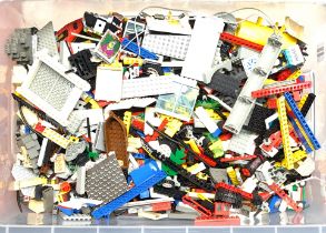 Lego a large unboxed quantity of loose items to include various colour parts, part built models, ...