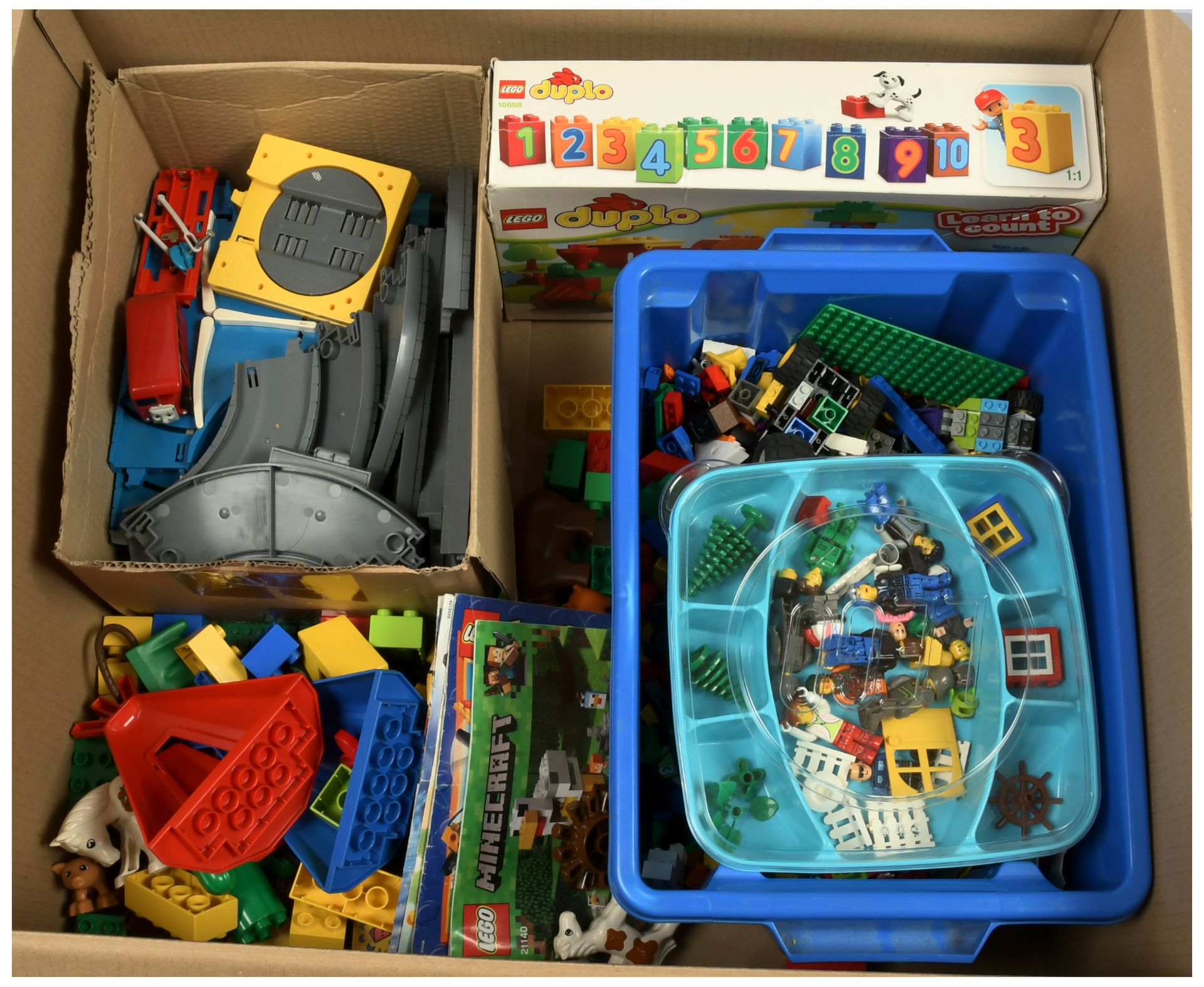 Lego & Duplo mixed group to include small plastic tub of loose parts, some minifigures, baseplate...