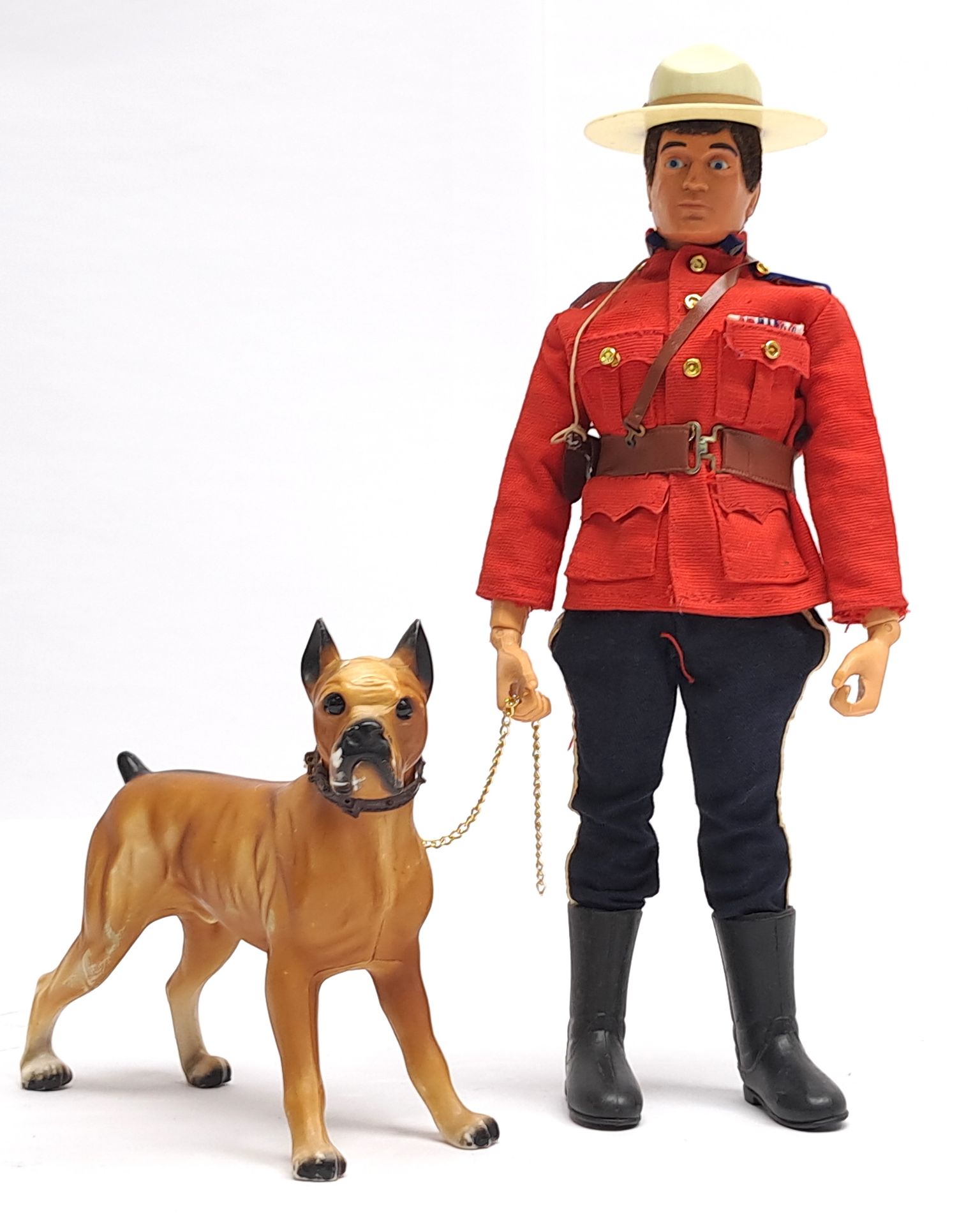 Palitoy Vintage Action Man Royal Canadian Mounted Police, dark flock hair, blue pants, eagle-eyes...