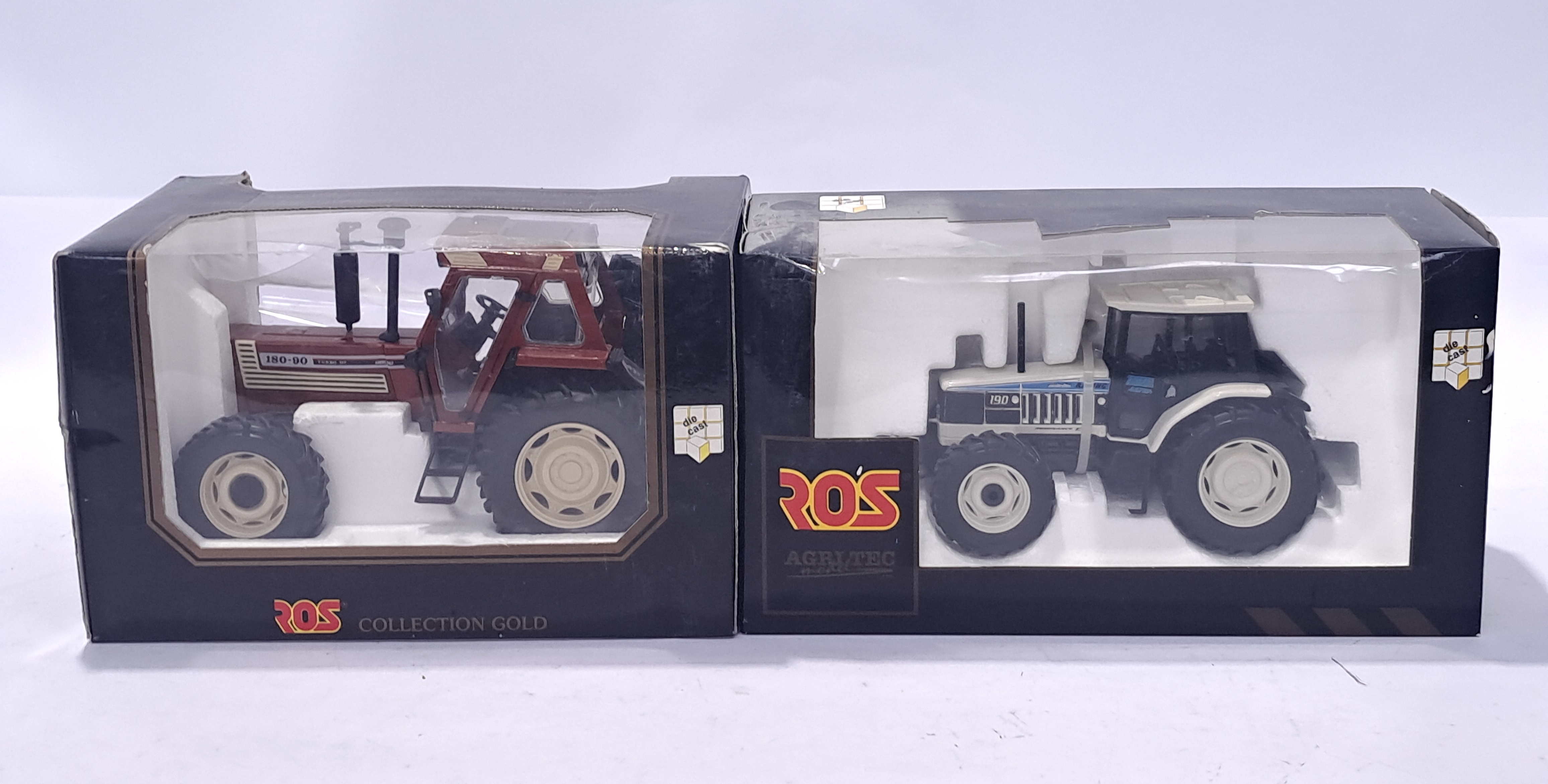 ROS 1/18th and similar scale boxed pair of Tractors. Not checked for completeness or correctness....