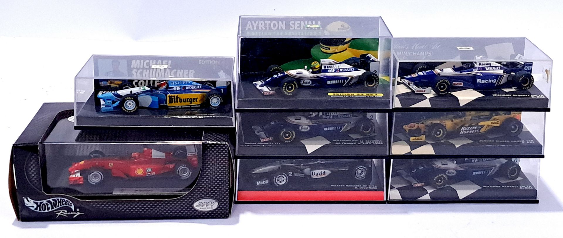 Minichamps and Hot Wheels, a mixed boxed group of F1 Cars. Conditions generally appear Excellent ...