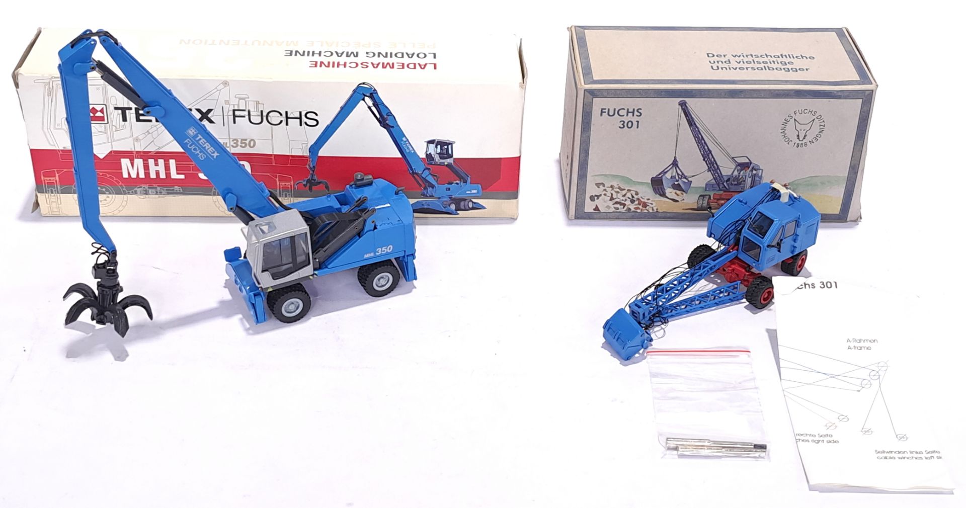 Conrad & NZG, a boxed 1:50 scale Fuchs Terex pair