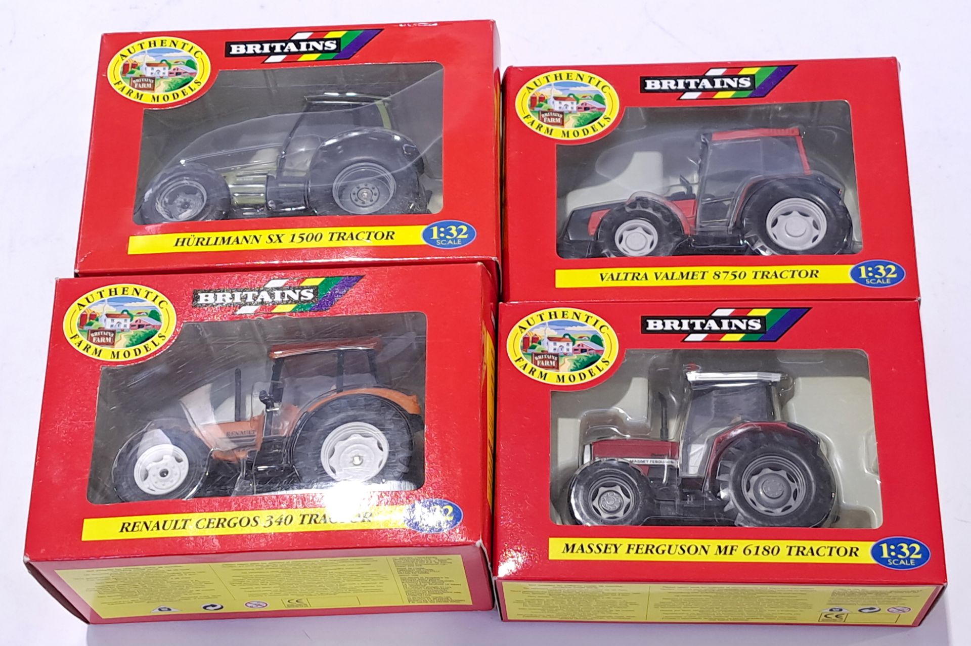 Britains Tractors 00225, 00038, 09439 and 9491 a boxed group. Not checked for completion or corre...