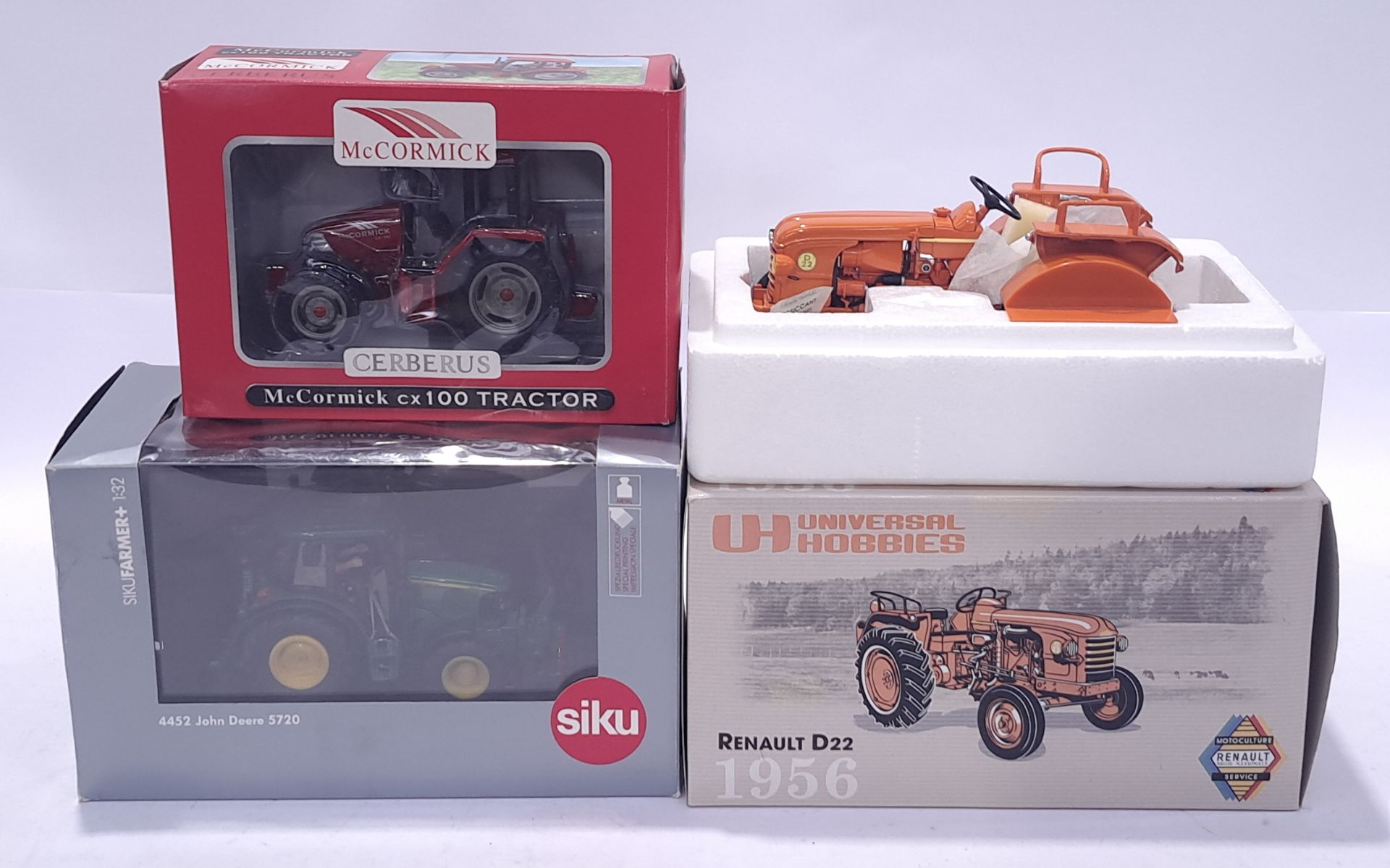 Siku, Universal Hobbies and similar, a mixed boxed Tractor group. Conditions generally appear Exc...