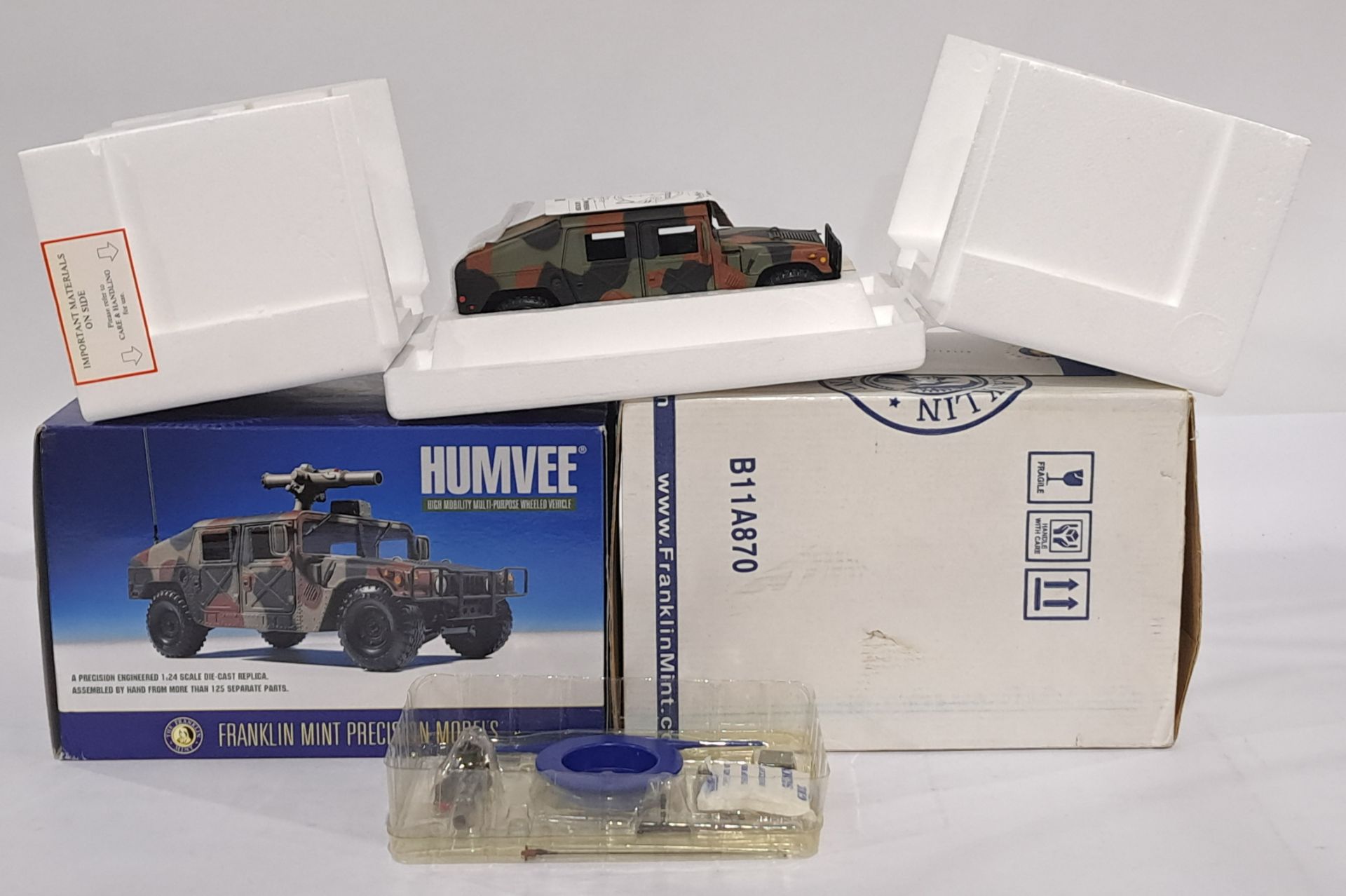 Franklin Mint 1/24 Scale B11A870 - Humvee Camouflage version Hummer. Conditions generally appear ...