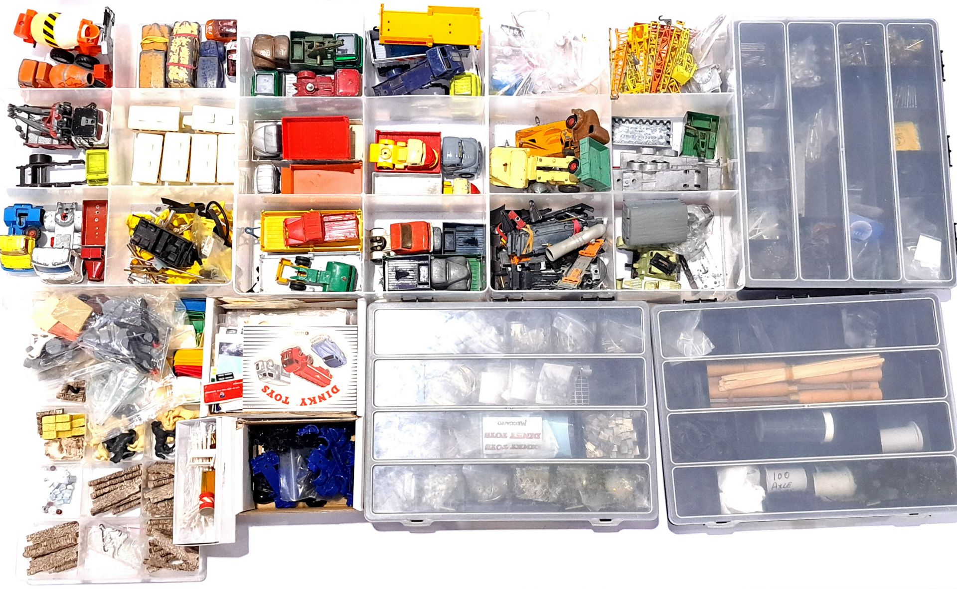 Dinky, Corgi and similar, a mixed unboxed group of Spare parts and a large number of accessories....