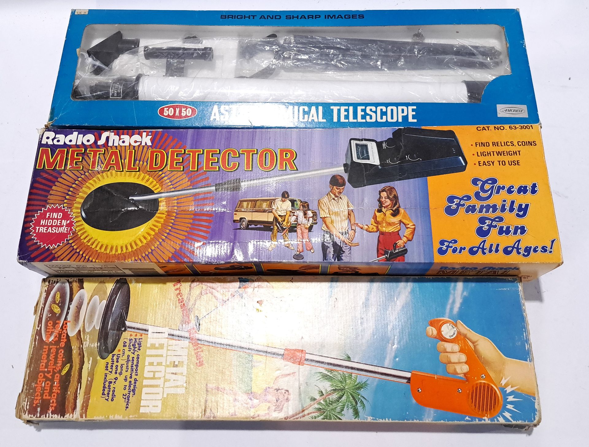 A mixed boxed group of Metal Detectors and Telescope. Unchecked for completion or correctness and...