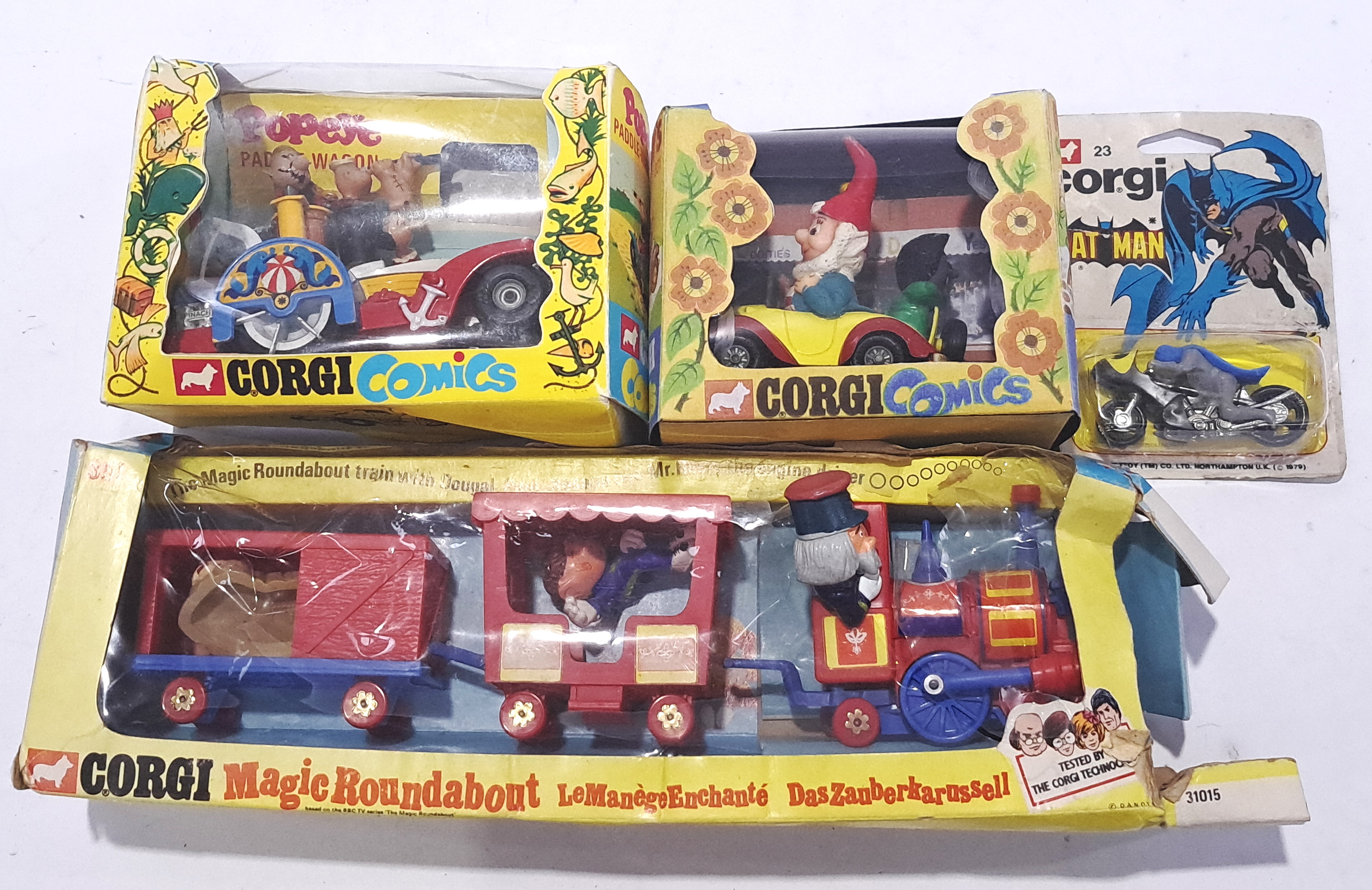 Corgi, a mixed group to include Noddys Car, Popeye (Re-pro boxes) and others similar. Conditions ...