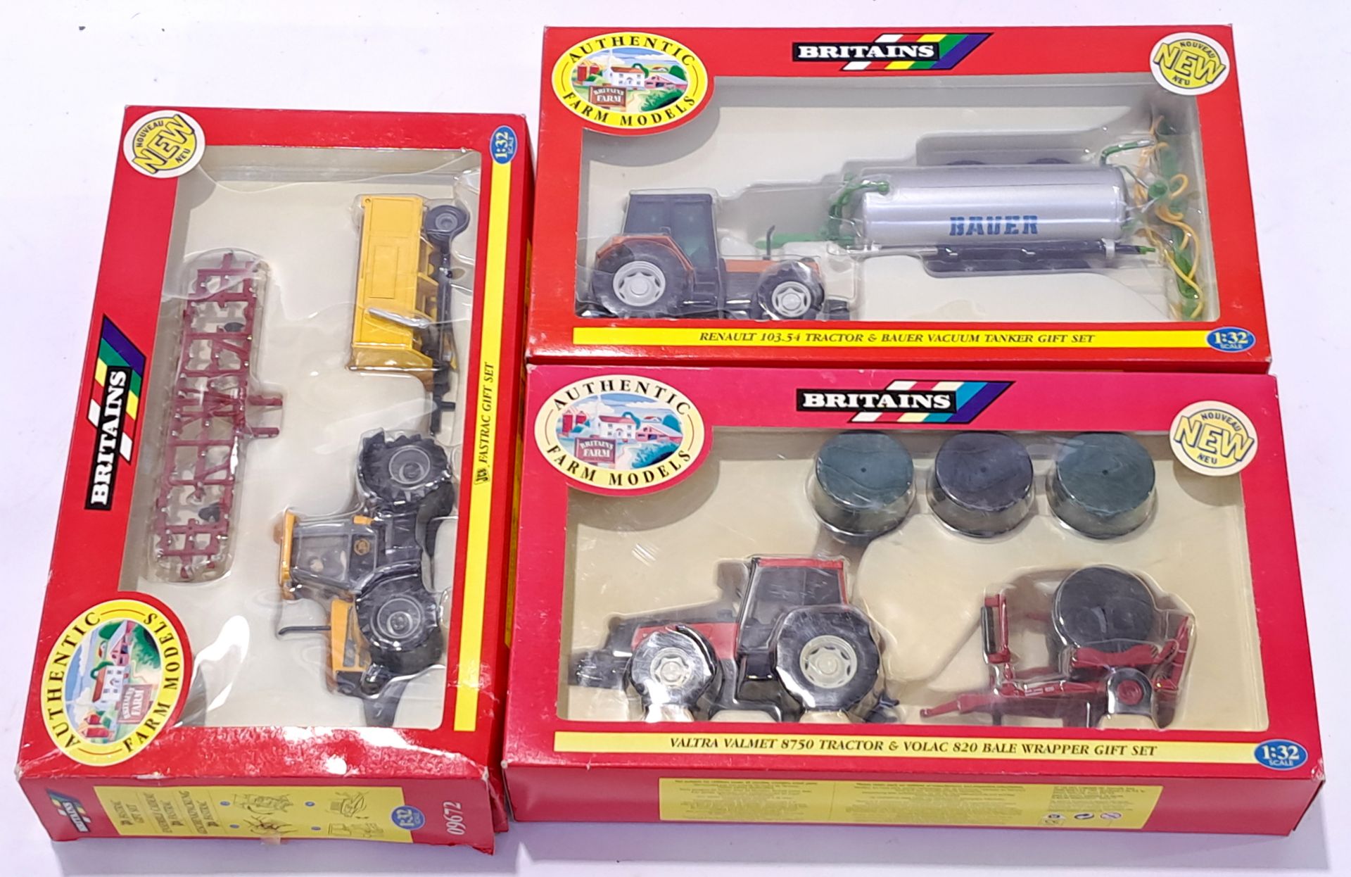 Britains Tractors 09672/3/4 a boxed trio. Not checked for completion or correctness. Conditions g...