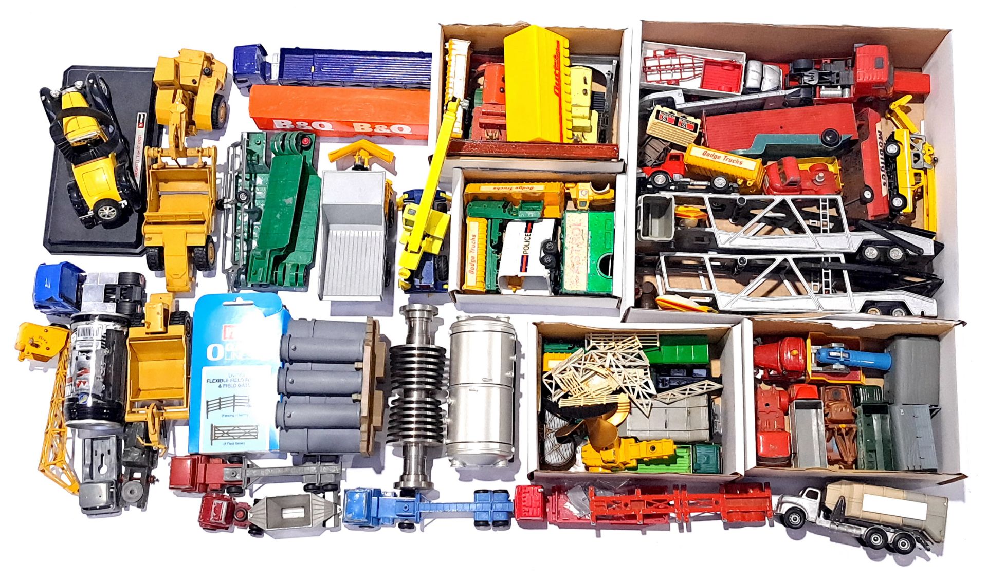 Dinky, Corgi and similar, a mixed unboxed group of Spare parts and a large number of accessories....