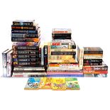 A large quantity of mixed themed hardback and paperback books and novels
