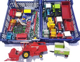 Britains, and similar, a mixed unboxed group of Tractors and farming equipment. Conditions genera...