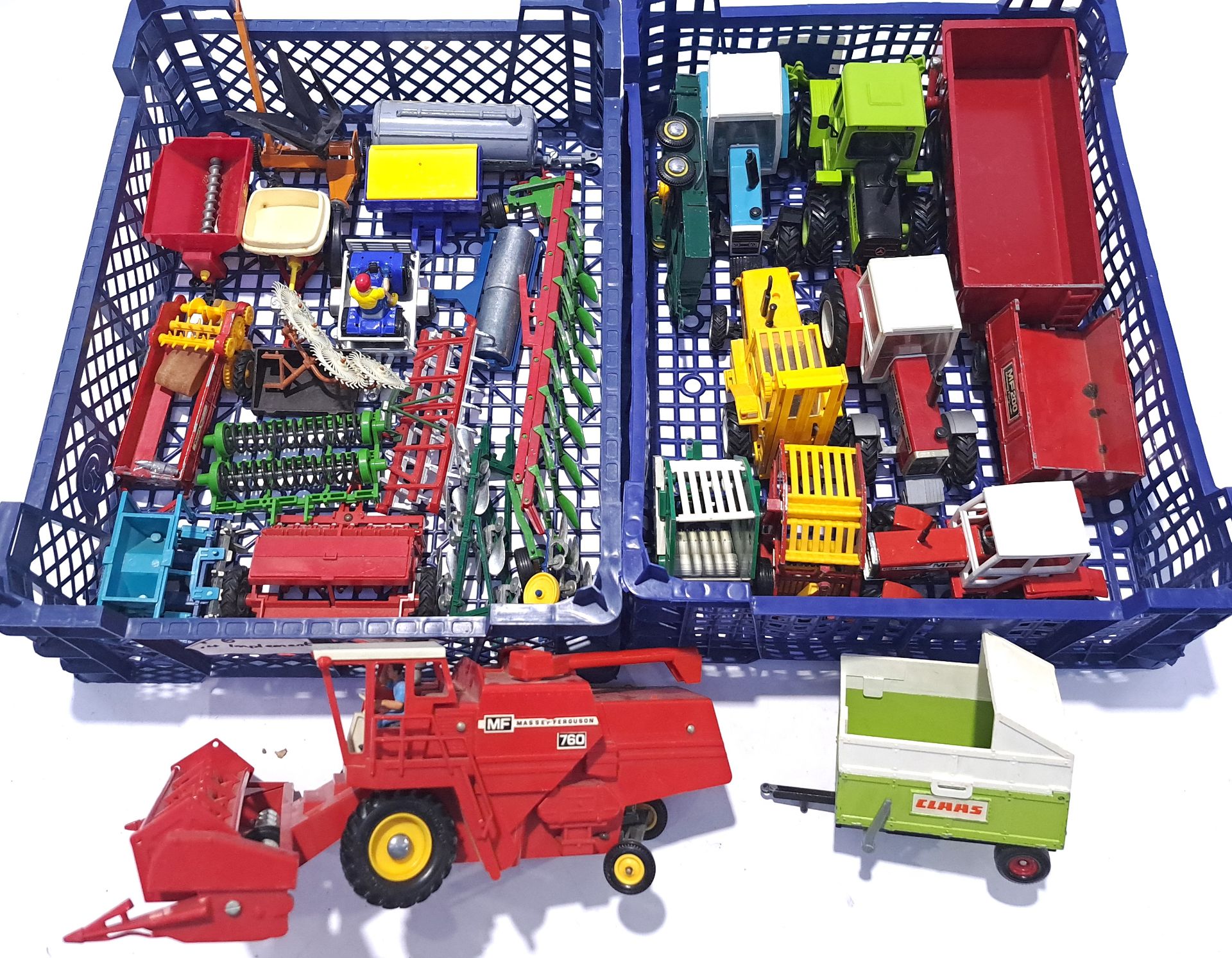 Britains, and similar, a mixed unboxed group of Tractors and farming equipment. Conditions genera...