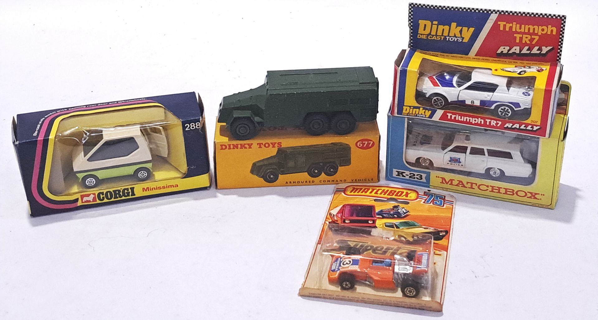 Dinky, Corgi and Matchbox, a mixed boxed group to include Dinky 207, Matchbox K-23 and others. Co...