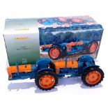 Universal Hobbies, a boxed 1:16th scale Ford DOE Triple D Tractor