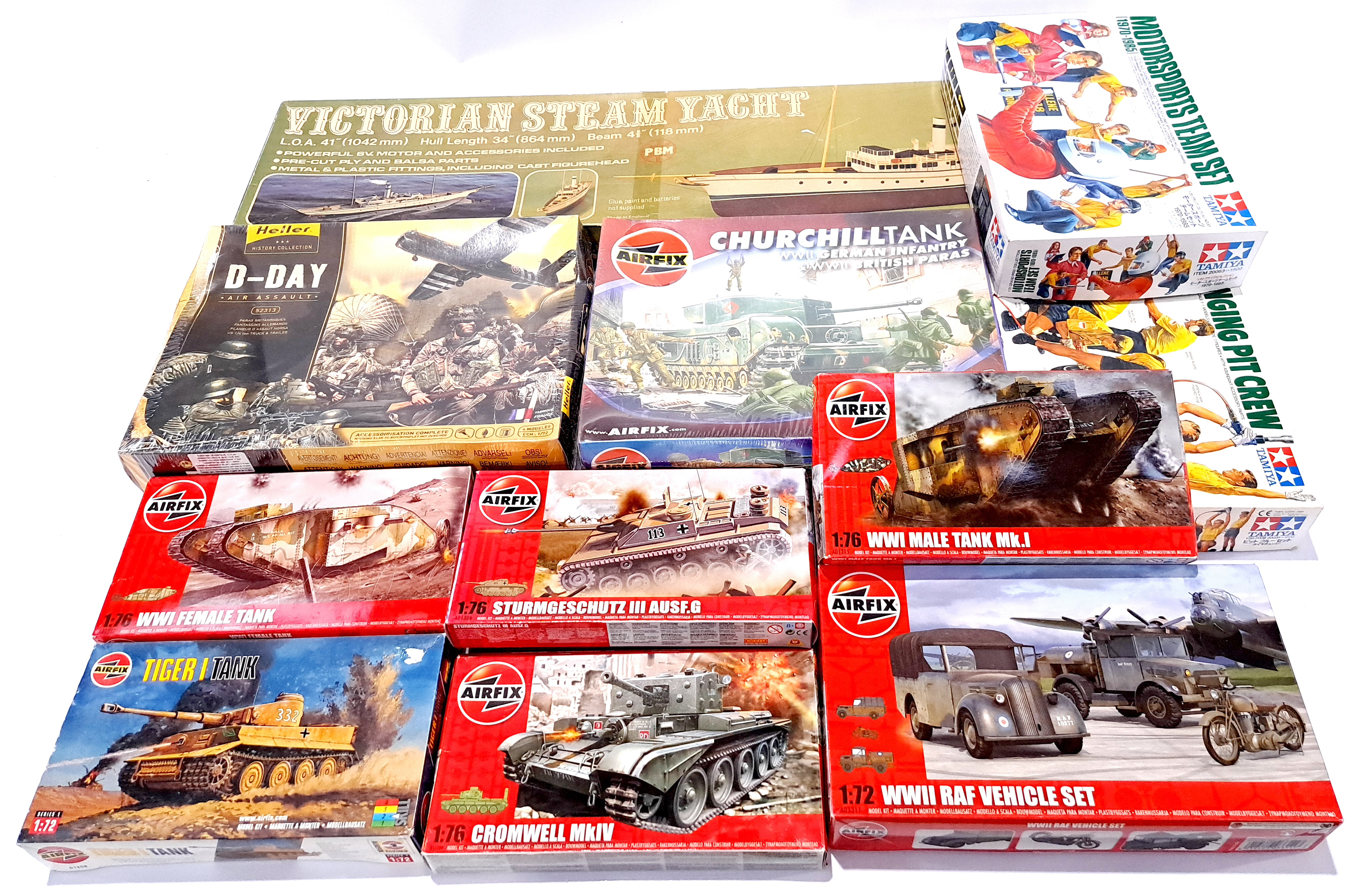 Airfix, Tamiya and similar, a mixed boxed group of scale Military vehicles and others.. Not check...