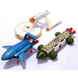 Dinky, a unboxed trio of Thunderbirds and similar to include USS Enterprise, Thunderbird 2 and Ea...