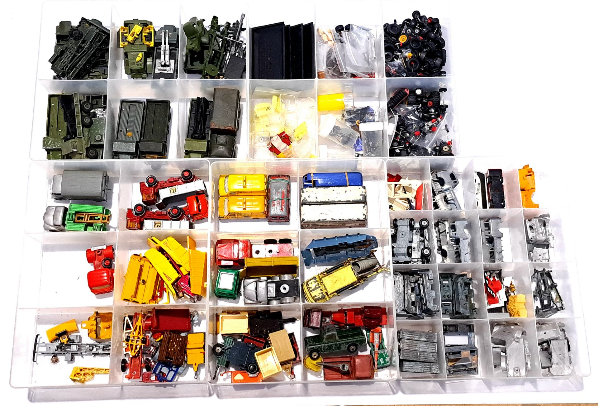 Spot-on Matchbox and similar, a mixed unboxed group of Spare parts and a large number of accessor...