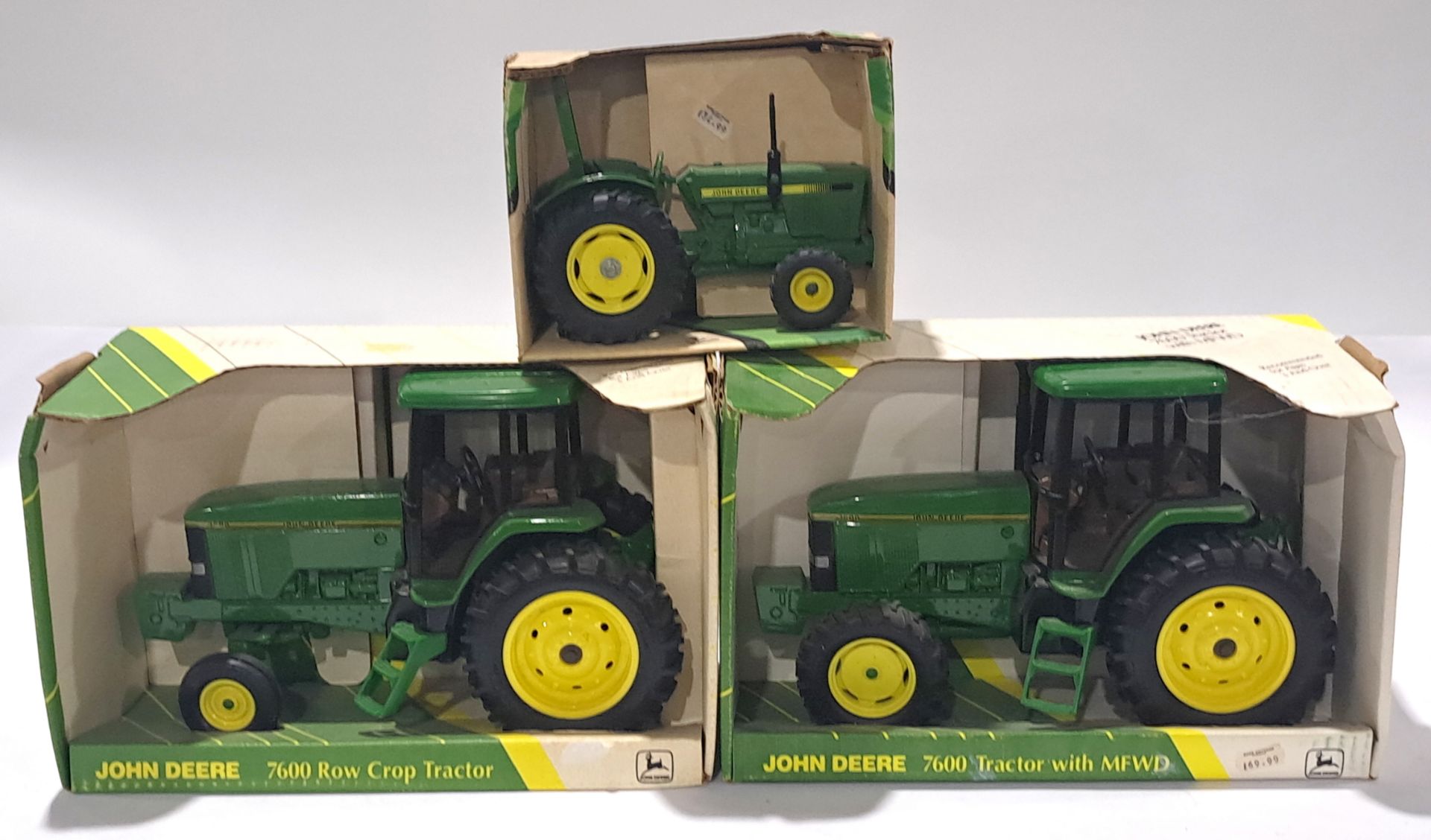 ERTL, a John Deere Tractor group to include #5619, 5627 and similar. Conditions generally appear ...