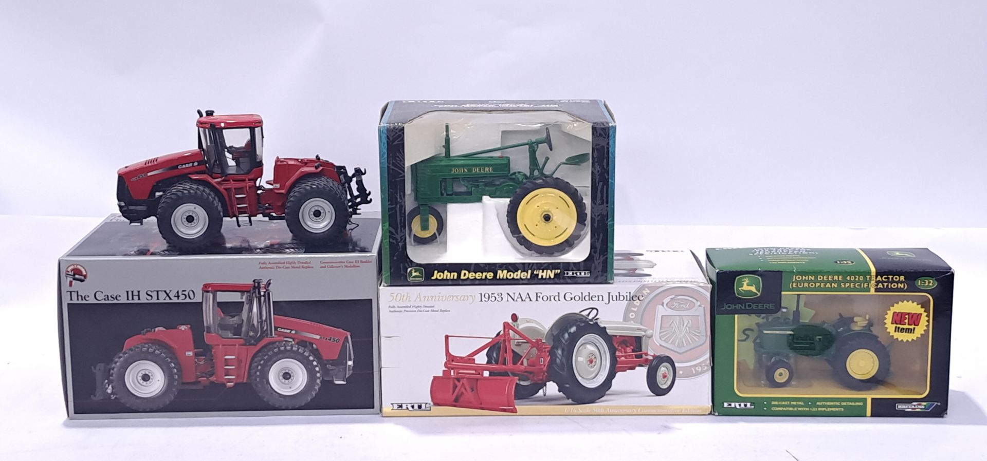 ERTL, a mixed boxed Tractor group to include 50th anniversary Tractor, John Deere Tractors and si...