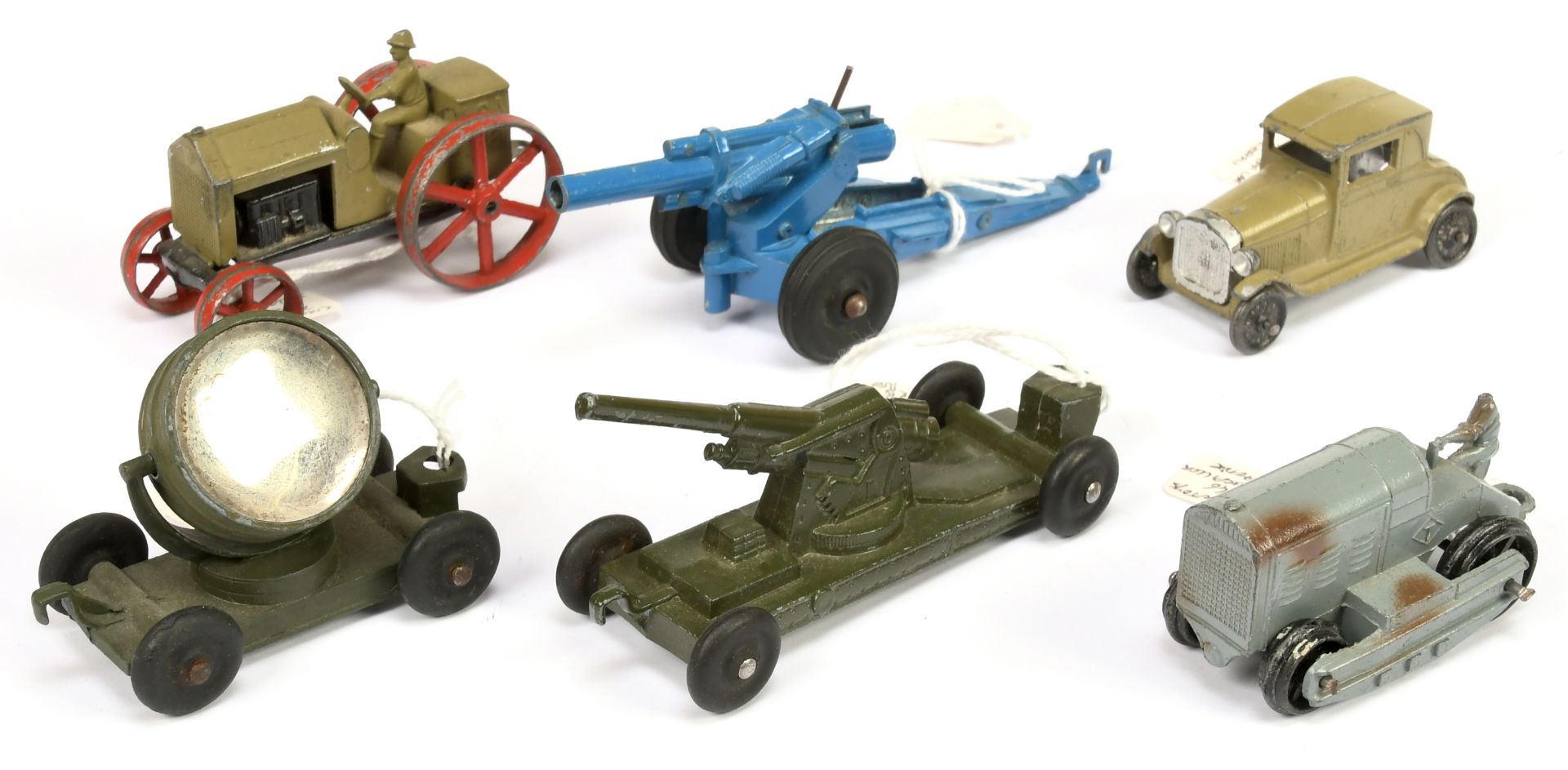 Tootsietoy group of 6 - to include Tractor, mobile searchlight field gun Plus others 